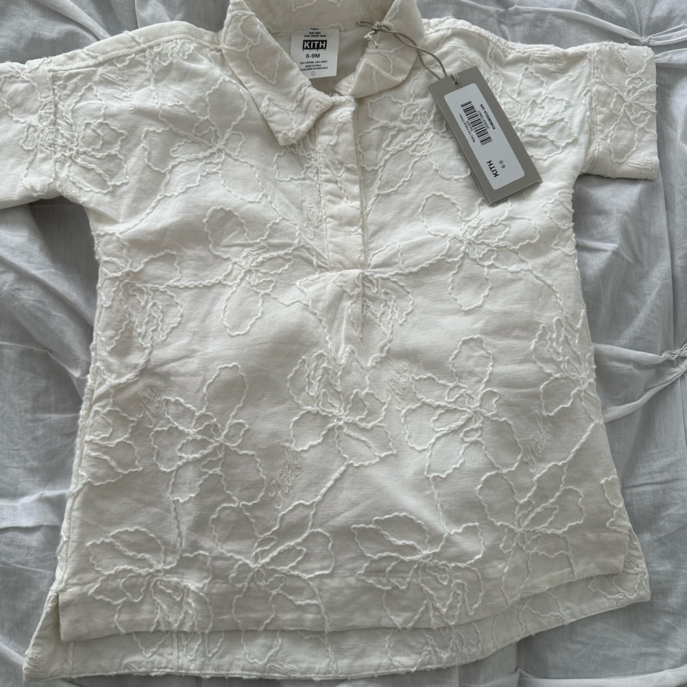 Kith baby iris katya white dress 
New never worn 
Size 6-9 months